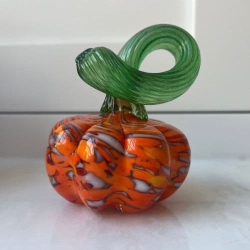 A small glass pumpkin